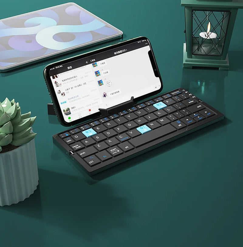 Mini Foldable Bluetooth Keyboard – Wireless, 3-Device Support, Rechargeable with Stand